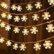 Светодиодная гирлянда Снежинка 1.5 м теплый белый на батарейках | 10 LED гирлянда с фигурками 2856803290 фото 2