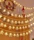 Світлодіодна гірлянда Сніжинки та зірки 3 м теплий білий 30 LED на батарейках для святкового декору Зірки + сніжинки 3 м фото 4